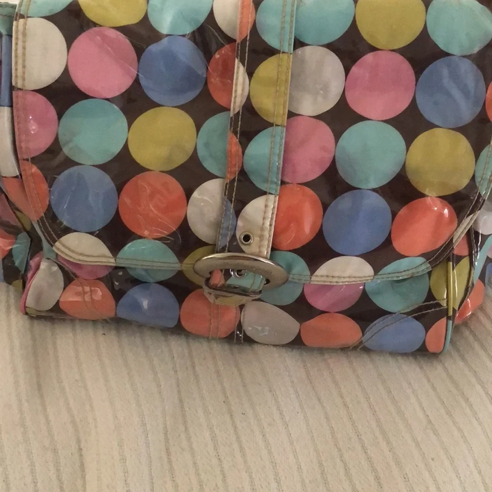 Multi colored easy wipe pokadot kalencom diaper bag